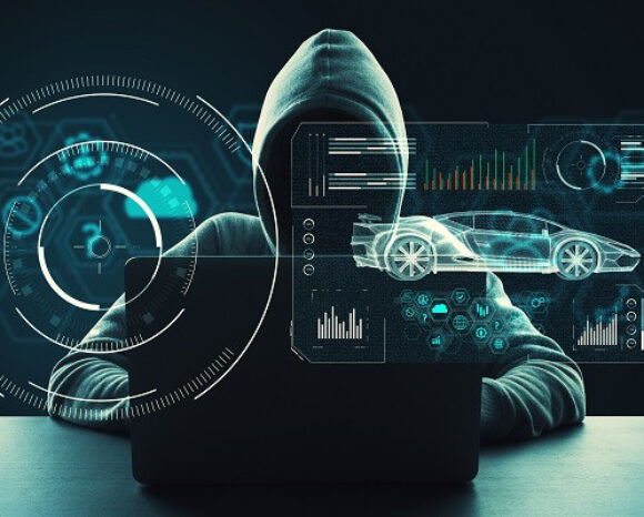 Eine Person in einer Kapuzenjacke sitzt an einem Laptop, umgeben von digitalen UI-Elementen, darunter ein Auto-Hologramm und Datendiagramme. Die düstere Atmosphäre konzentriert sich auf Technologie- und Cyber-Themen und unterstreicht den Aufstieg vernetzter Fahrzeuge.