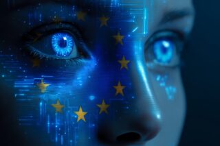 Gesicht mit blauen Augen mit Europa Flagge